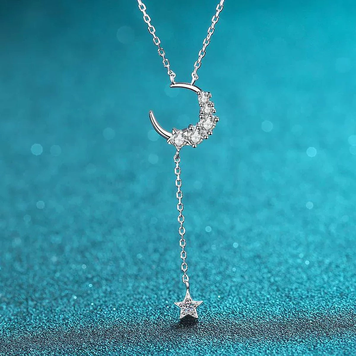 Moon and Star Moissanite Pendant Necklace in Rhodium-Plated S925 sterling silver product scene view showing chain and setting detail