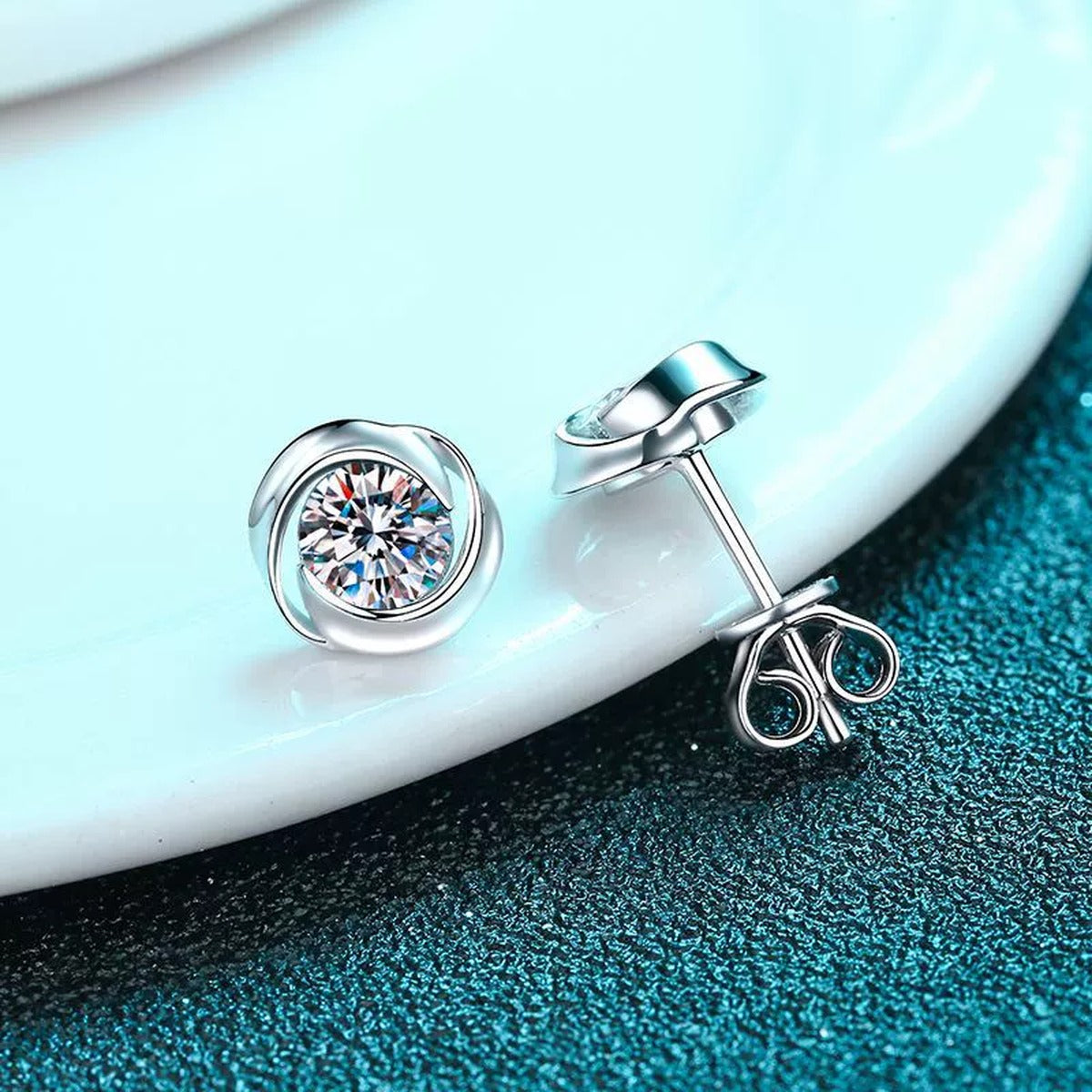 Bezel Round Moissanite Stud Earrings in Rhodium-Plated S925 sterling silver product scene view showing angled setting detail