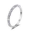 Slim Pave Moissanite Band Ring in rhodium-plated S925 sterling silver on clean white background