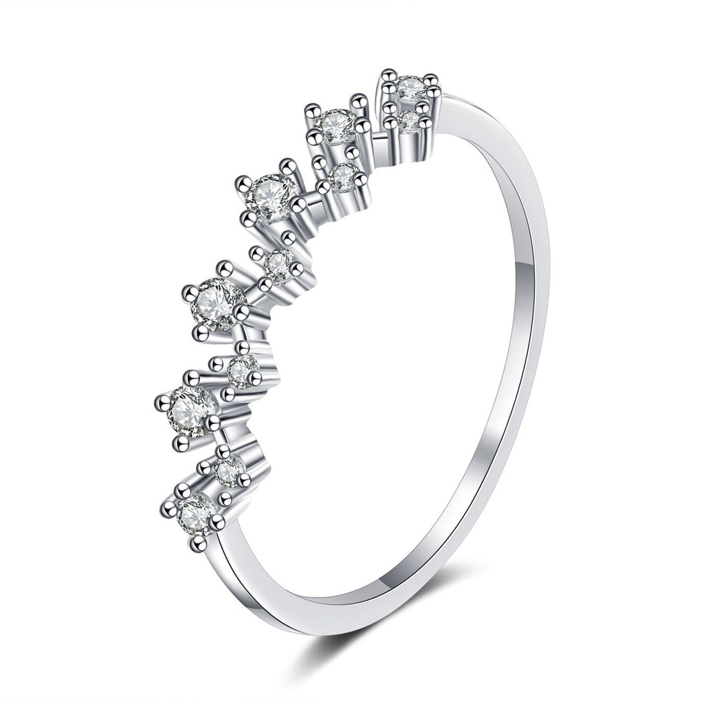 Round Moissanite Wave Band Ring in rhodium-plated S925 sterling silver on clean white background