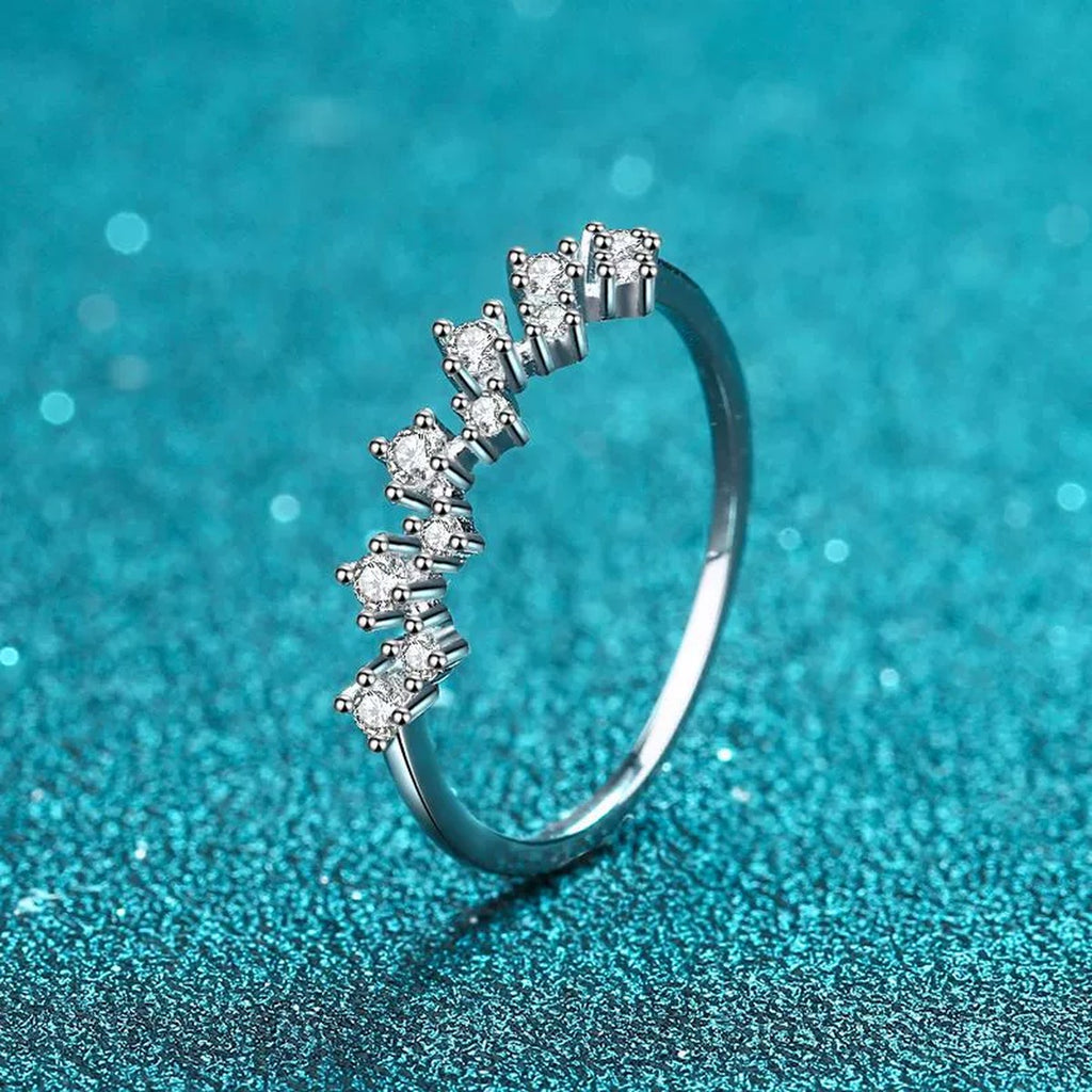 Round Moissanite Wave Band Ring product view showing moissanite setting and rhodium finish