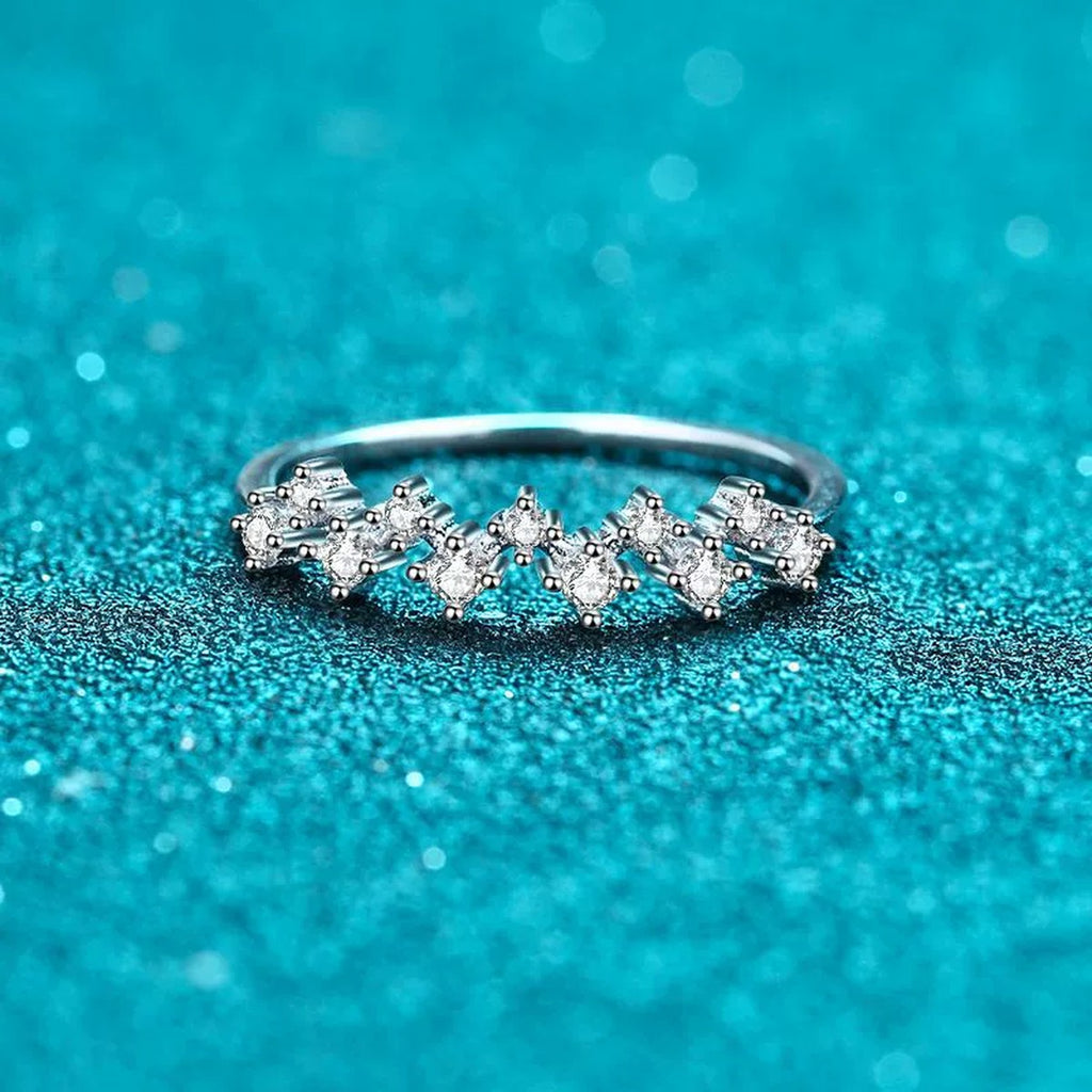Round Moissanite Wave Band Ring product view showing moissanite setting and rhodium finish