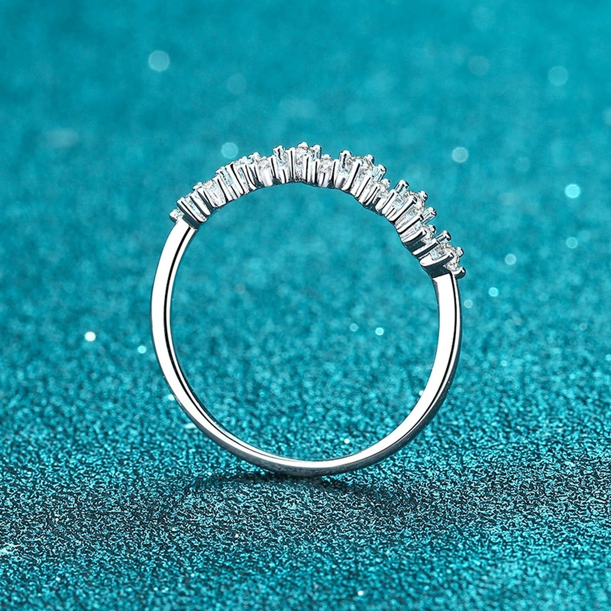 Round Moissanite Wave Band Ring product view showing moissanite setting and rhodium finish