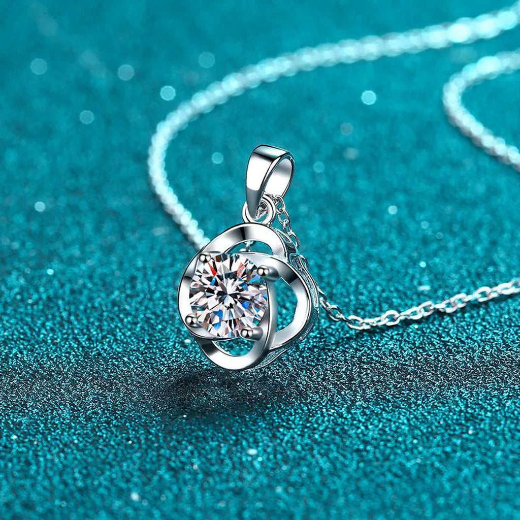 Round Moissanite Pendant Necklace in Rhodium-Plated S925 sterling silver product scene view showing angled sparkle