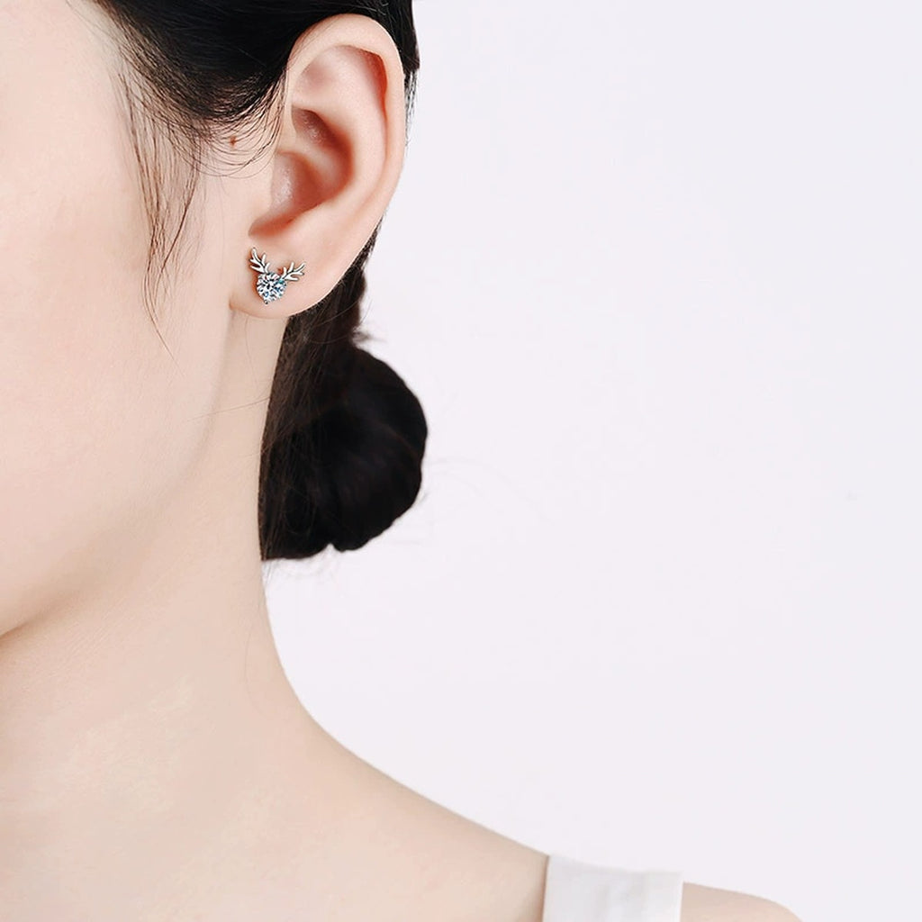 Deer Antler Moissanite Stud Earrings in Rhodium-Plated S925 sterling silver worn on ear by model showing scale, placement, and stud earrings styling