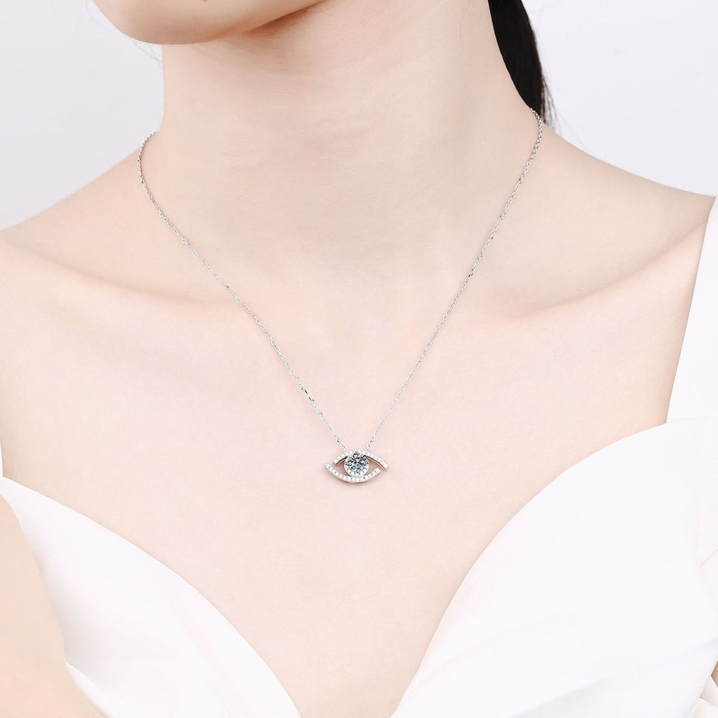 All-Seeing Eye Moissanite Pendant Necklace with CZ in Rhodium-Plated S925 sterling silver worn on neckline by model showing scale and adjustable chain styling