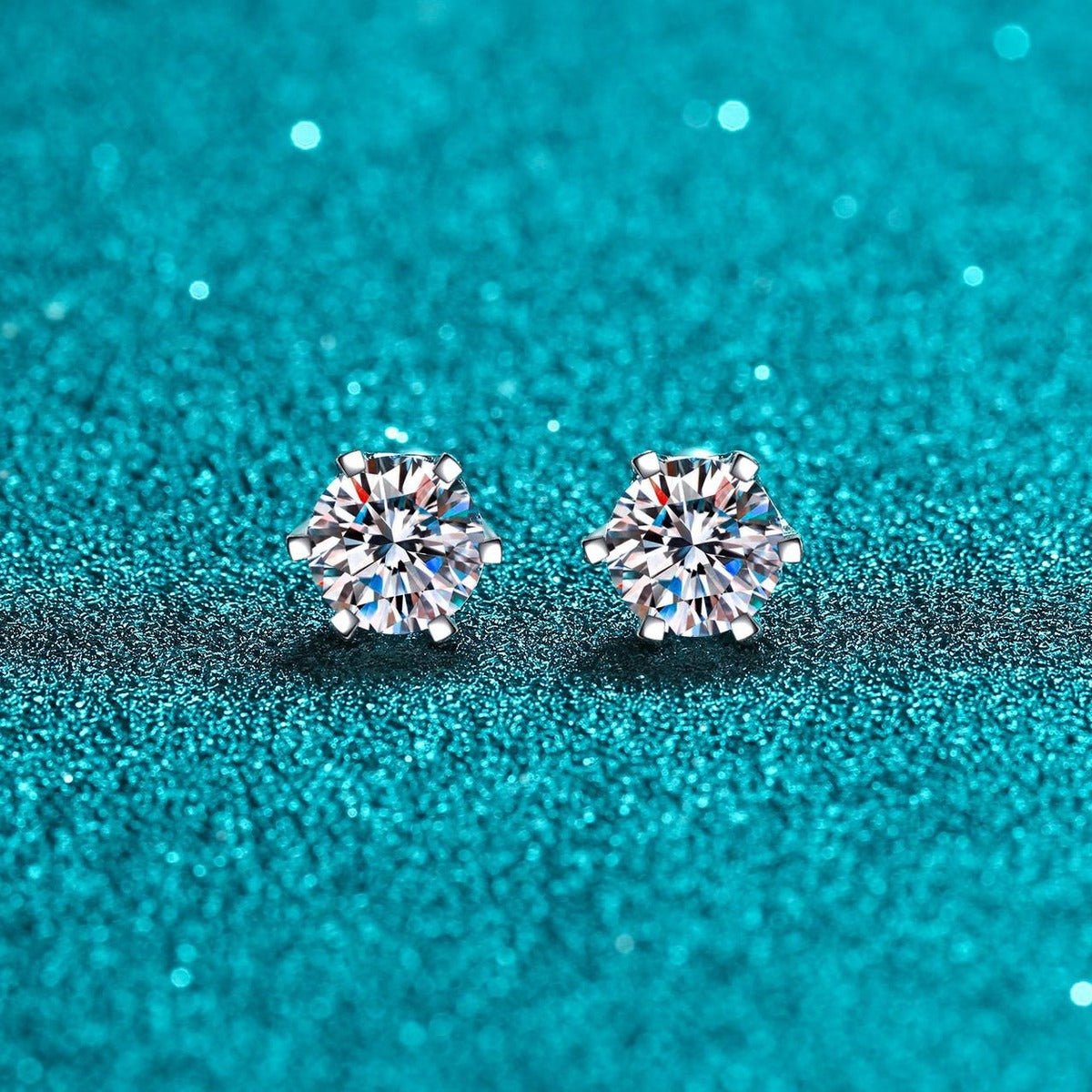 Round Moissanite Stud Earrings in Rhodium-Plated S925 sterling silver product scene view showing front sparkle