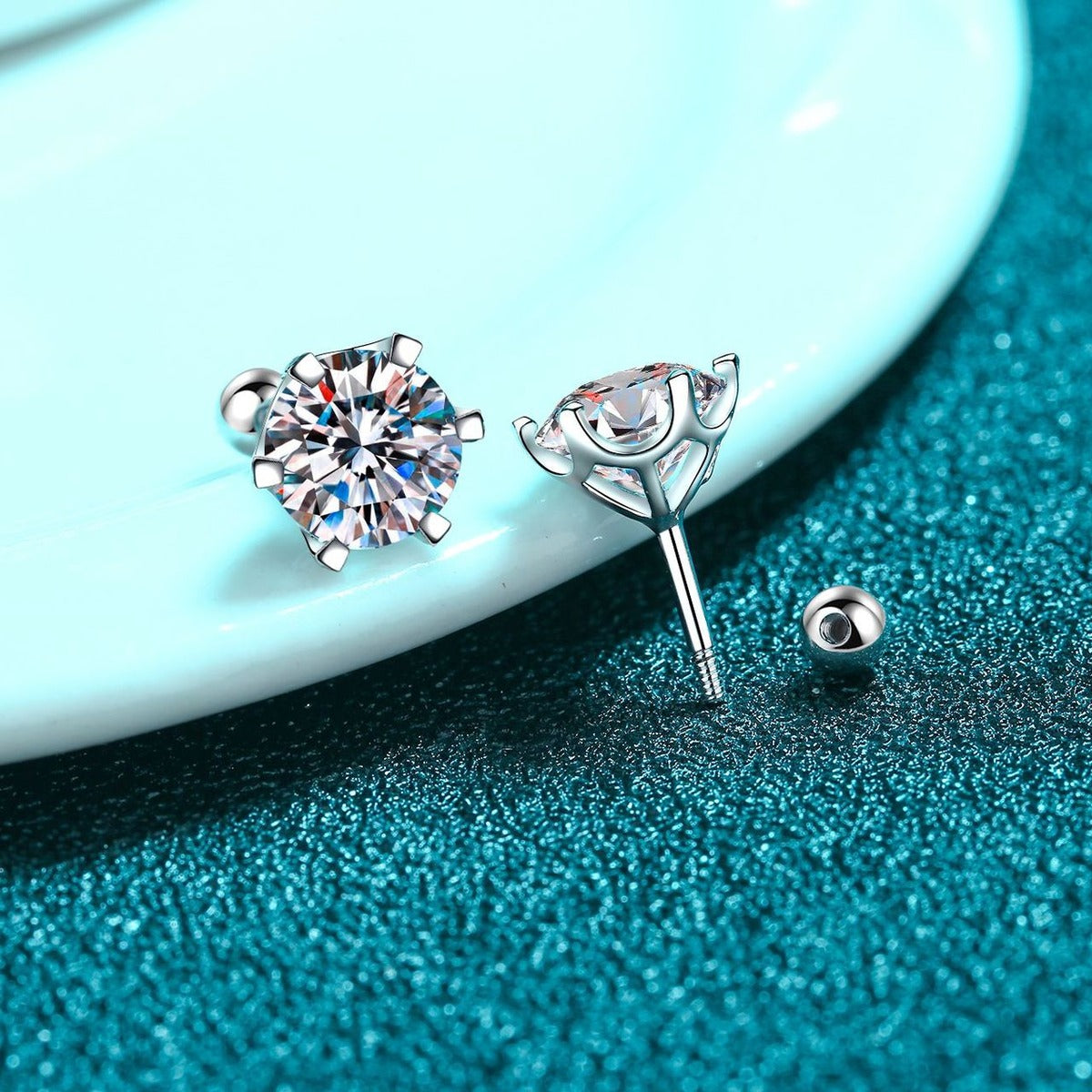 Round Moissanite Stud Earrings in Rhodium-Plated S925 sterling silver product scene view showing pair comparison