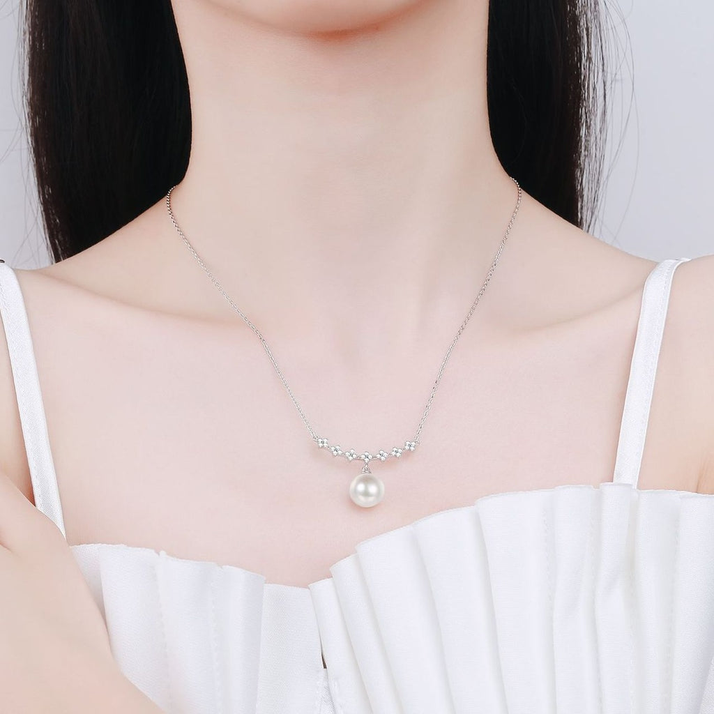 Clover Moissanite Pearl Pendant Necklace in Rhodium-Plated S925 sterling silver neckline model view showing pendant scale and adjustable chain