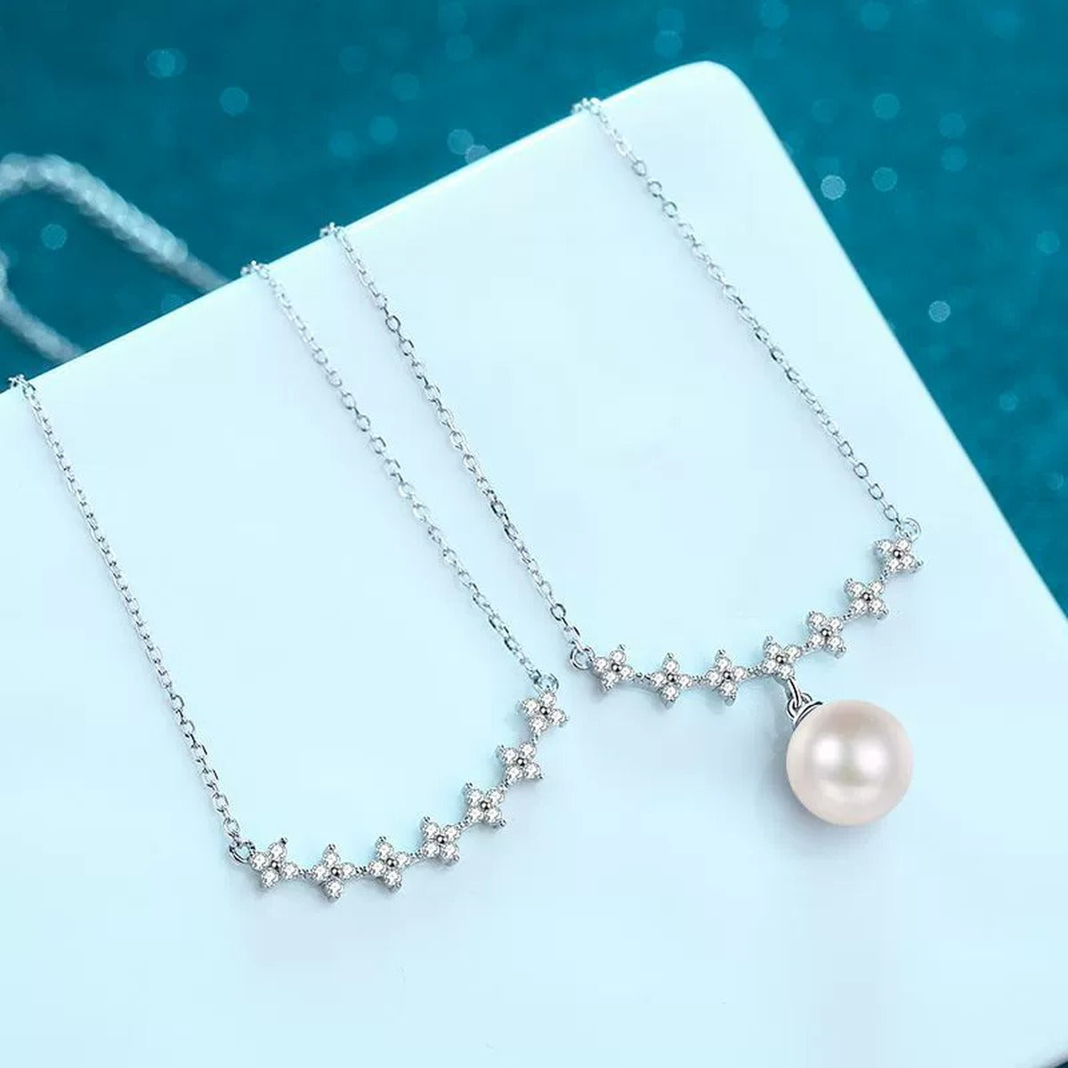 Clover Moissanite Pearl Pendant Necklace in Rhodium-Plated S925 sterling silver angled product detail view