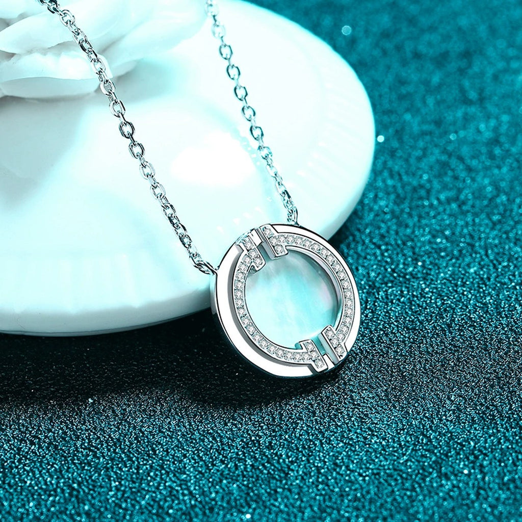 Mother-of-Pearl Disc Pendant Necklace in Rhodium-Plated S925 sterling silver product scene view showing chain and setting detail