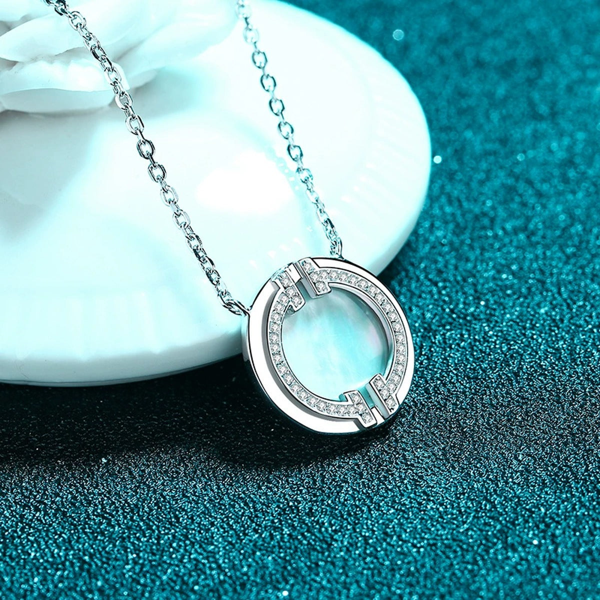 Mother-of-Pearl Disc Pendant Necklace in Rhodium-Plated S925 sterling silver product scene view showing chain and setting detail