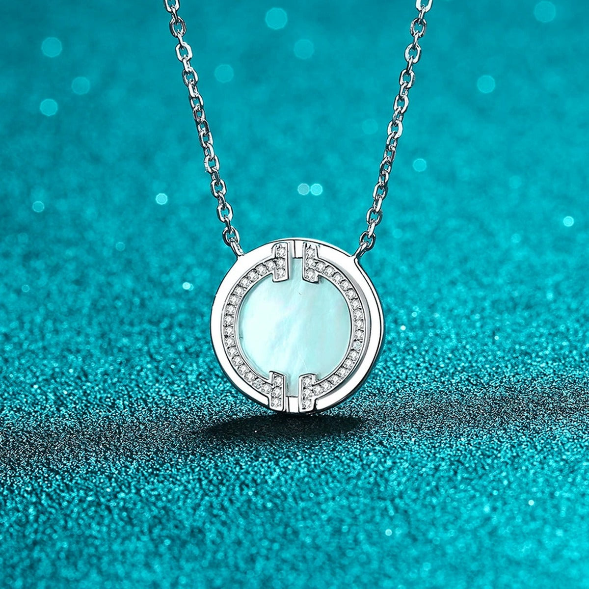 Mother-of-Pearl Disc Pendant Necklace in Rhodium-Plated S925 sterling silver product scene view showing angled sparkle