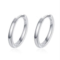 Minimal Huggie Hoop Earrings in Rhodium-Plated S925 sterling silver on white background showing the full pair, polished huggie hoop shape, and huggie hoop earrings silhouette