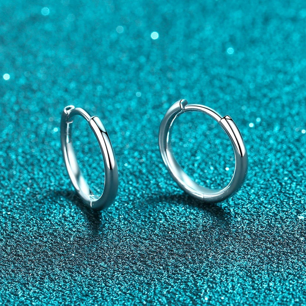 Minimal Huggie Hoop Earrings in Rhodium-Plated S925 sterling silver product scene view showing front detail