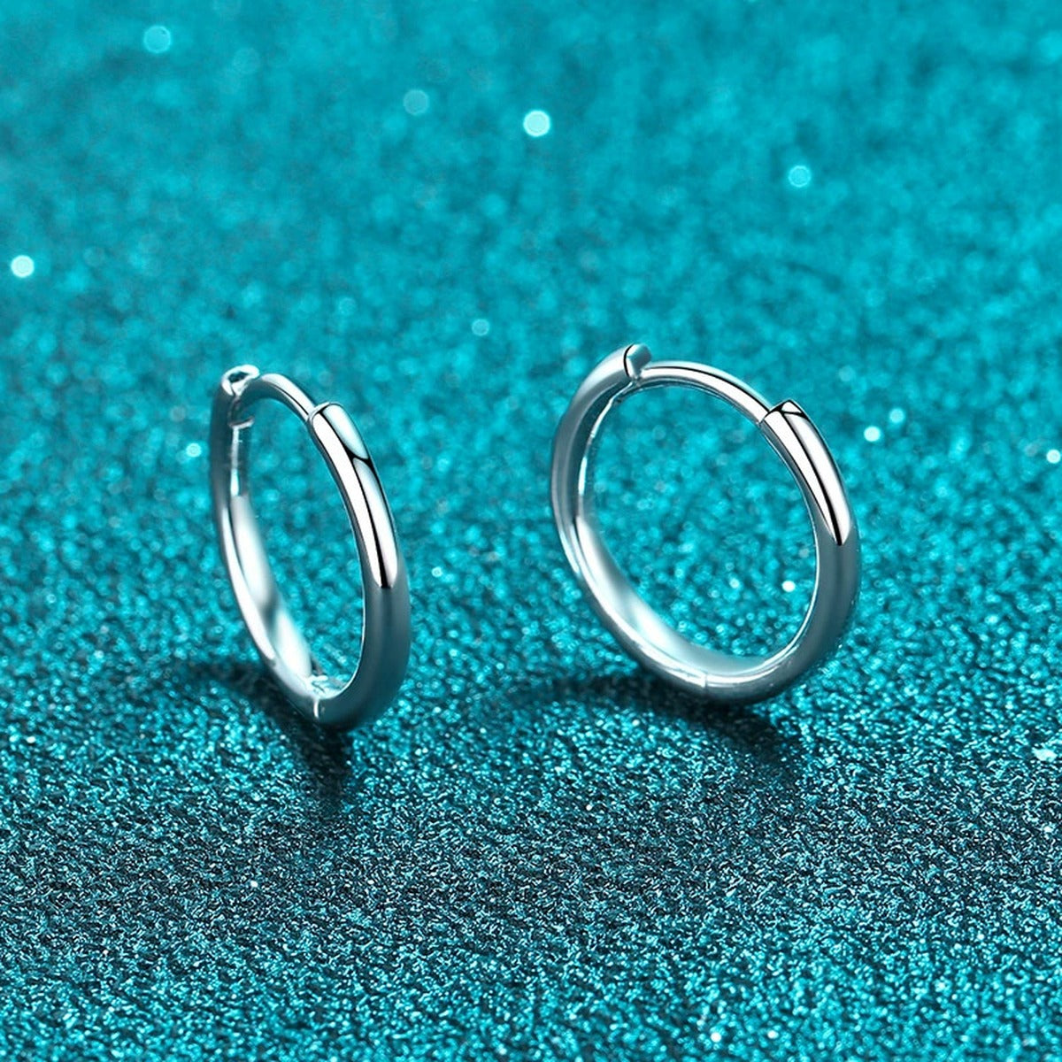 Minimal Huggie Hoop Earrings in Rhodium-Plated S925 sterling silver product scene view showing side profile