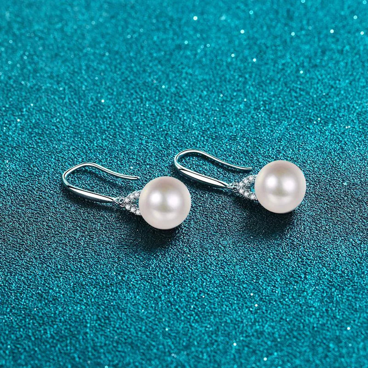 Moissanite Pearl Hook Dangle Earrings in Rhodium-Plated S925 sterling silver product scene view showing angled setting detail