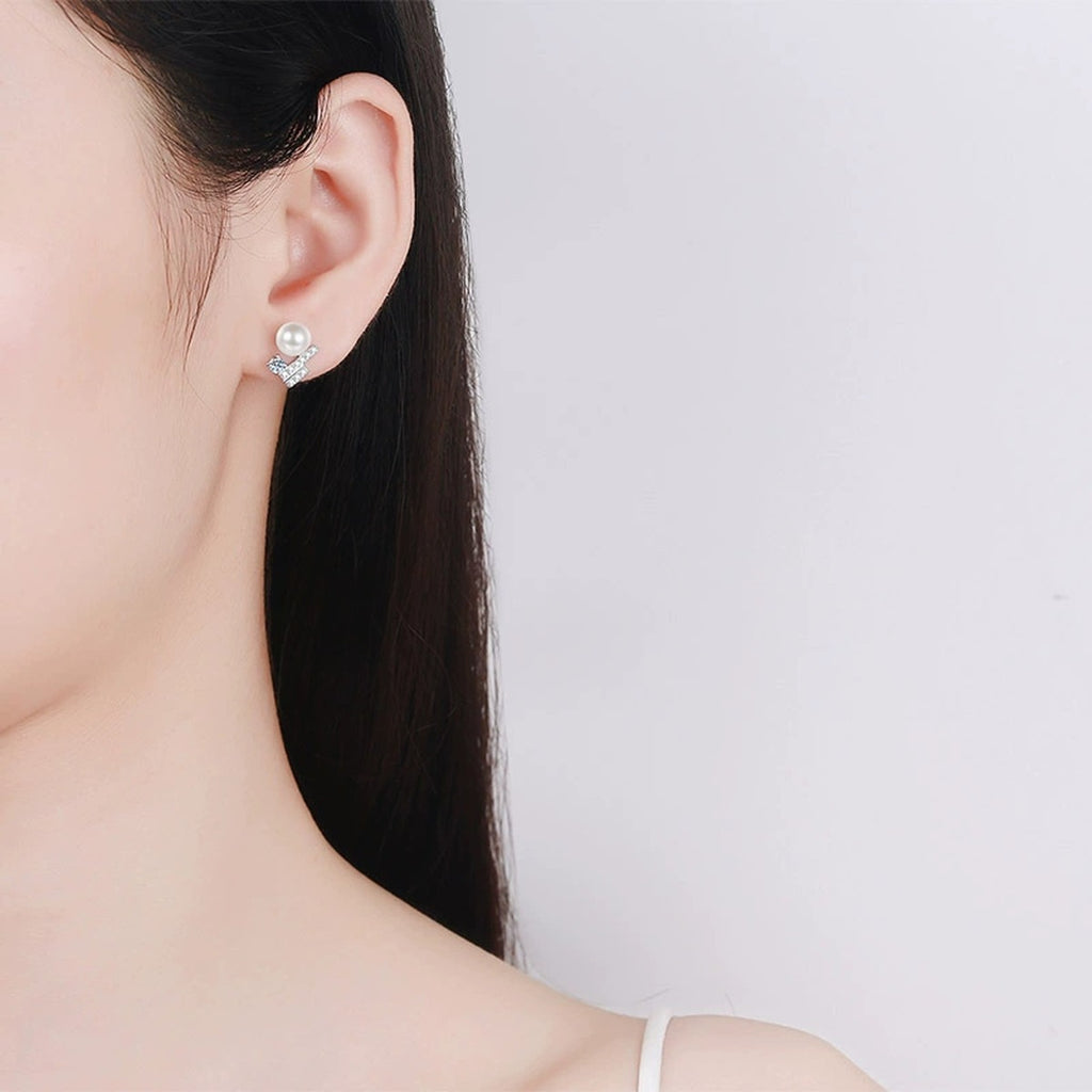 Pearl Bar Moissanite Stud Earrings in Rhodium-Plated S925 sterling silver worn on ear by model showing scale, placement, and stud earrings styling