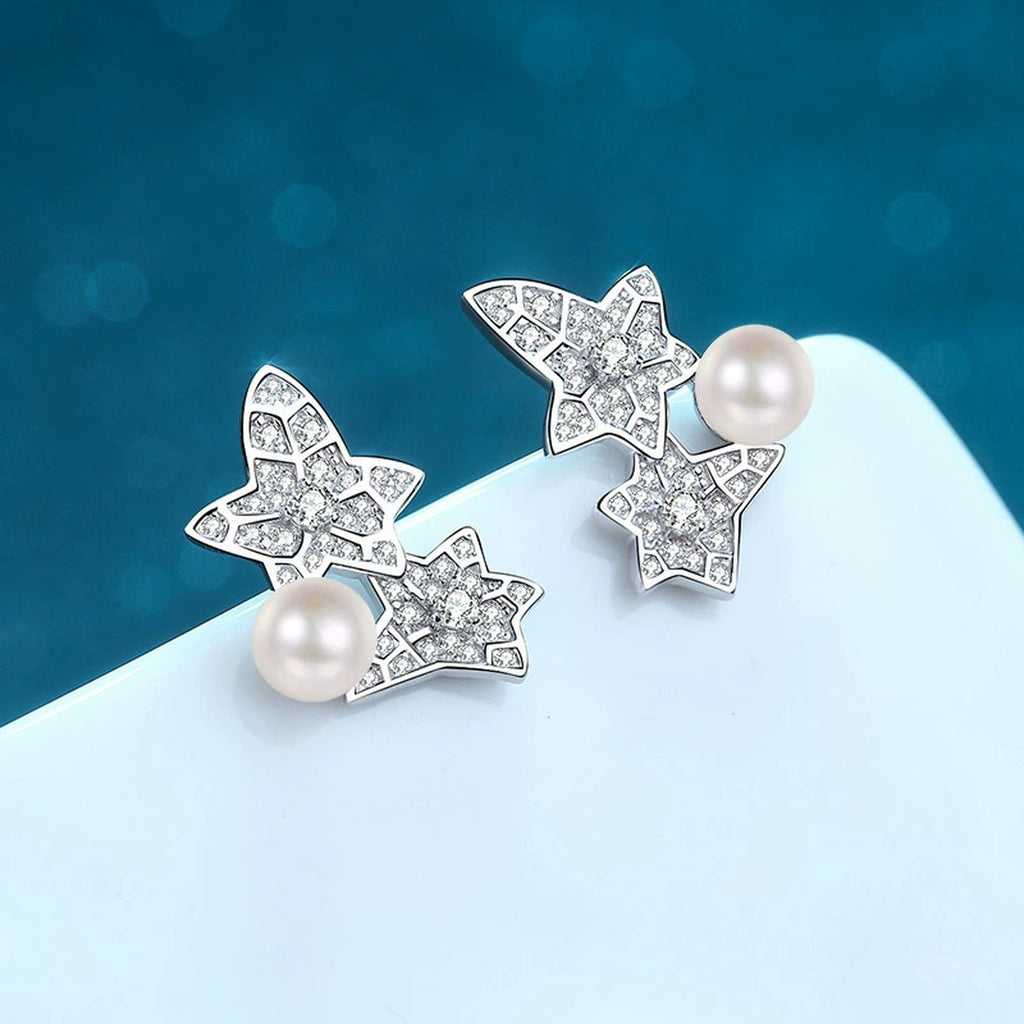 Leaf Pearl Moissanite Stud Earrings in Rhodium-Plated S925 sterling silver product scene view showing angled setting detail