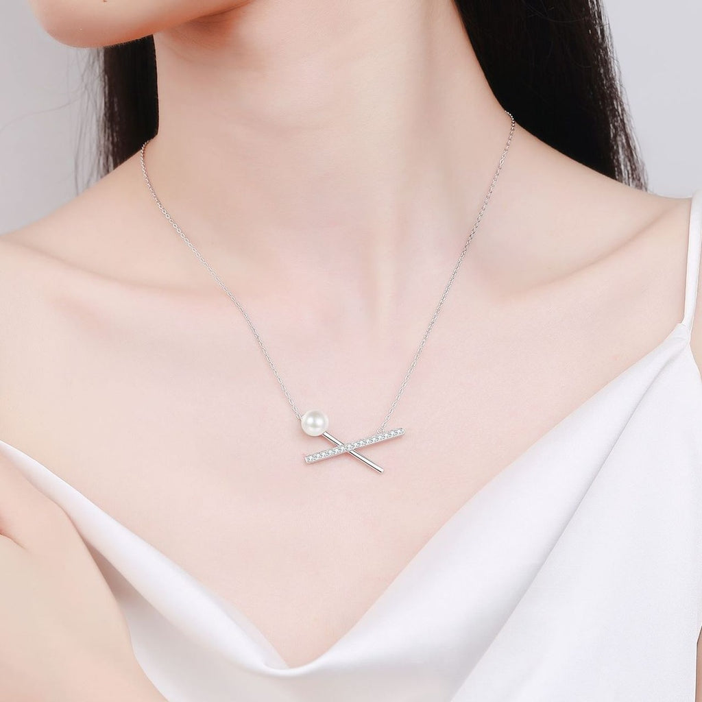 X Motif Moissanite Pearl Pendant Necklace in Rhodium-Plated S925 sterling silver neckline model view showing pendant scale and adjustable chain