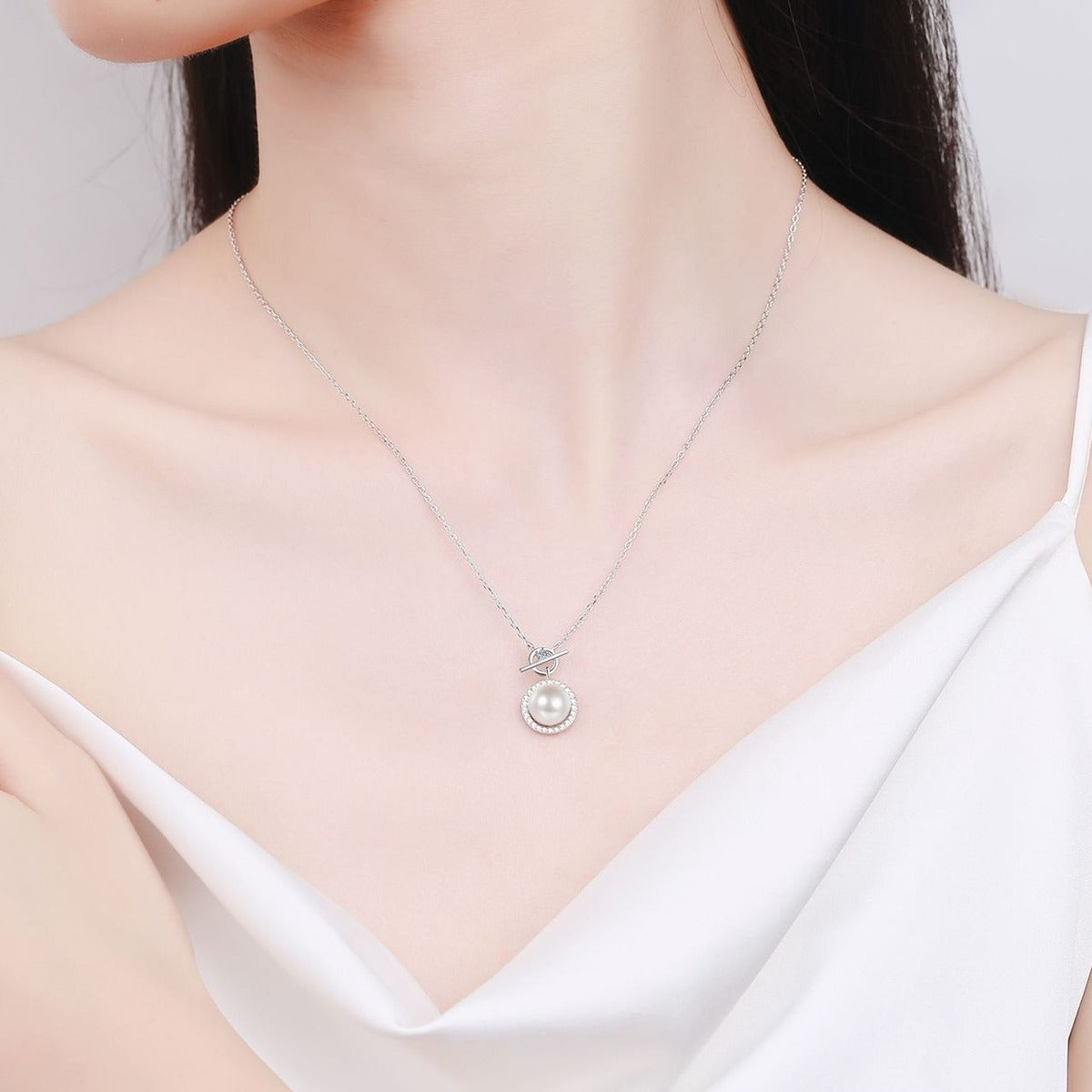 Halo Moissanite Pearl Pendant Necklace in Rhodium-Plated S925 sterling silver neckline model view showing pendant scale and adjustable chain
