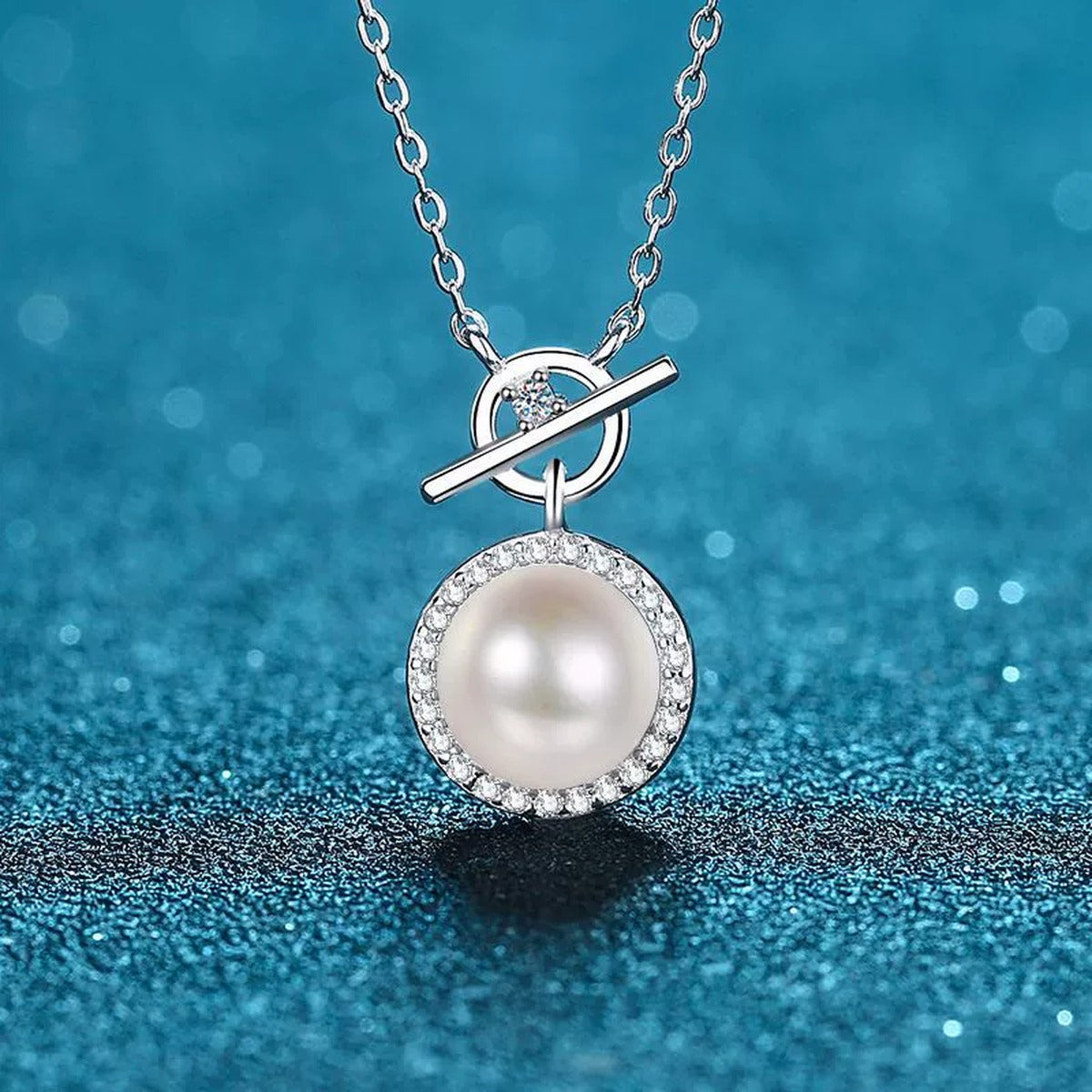 Halo Moissanite Pearl Pendant Necklace in Rhodium-Plated S925 sterling silver close-up product scene showing pendant setting