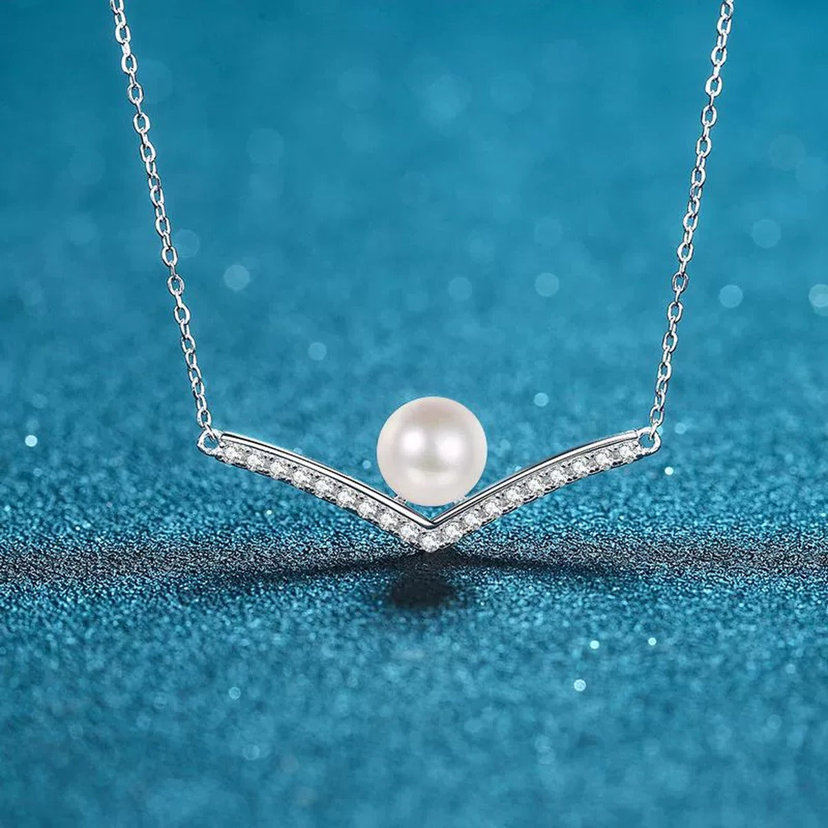 V Motif Moissanite Pearl Pendant Necklace in Rhodium-Plated S925 sterling silver close-up product scene showing pendant setting