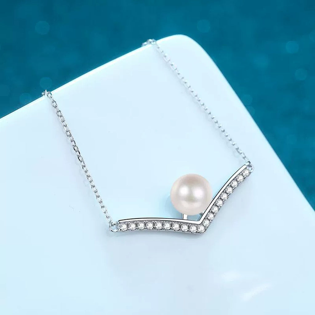 V Motif Moissanite Pearl Pendant Necklace in Rhodium-Plated S925 sterling silver angled product detail view