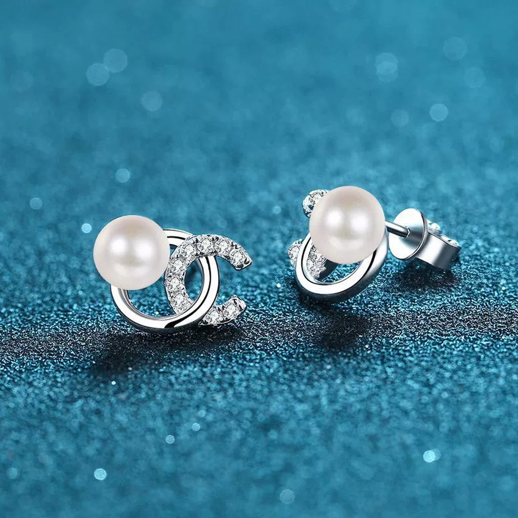 Swirl Pearl Moissanite Stud Earrings in Rhodium-Plated S925 sterling silver product scene view showing angled setting detail