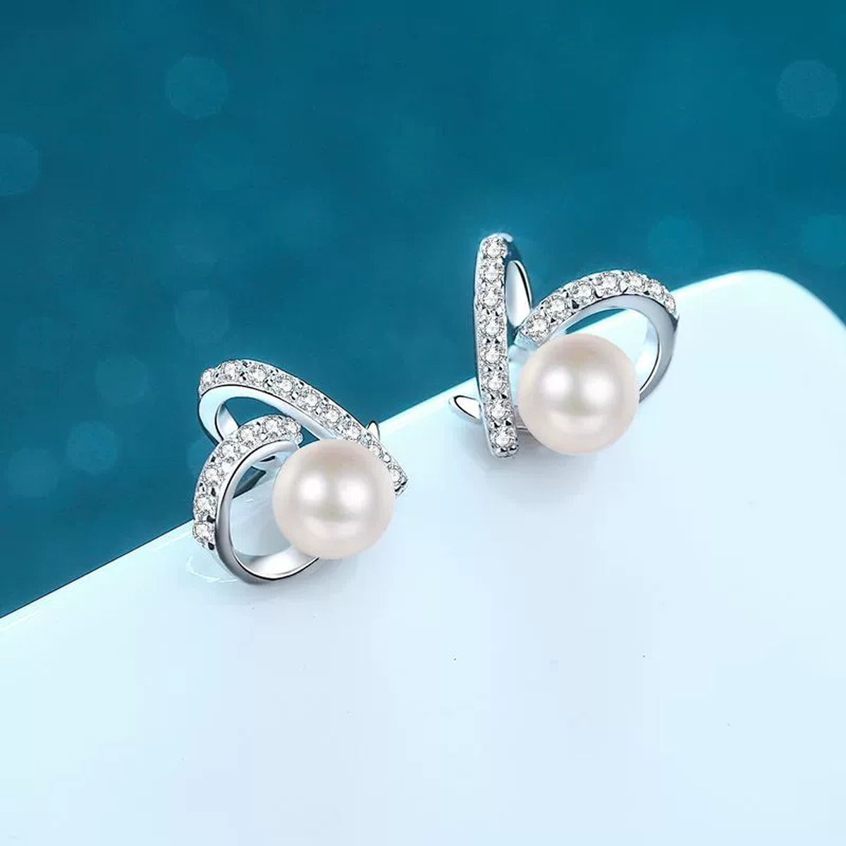Ribbon Pearl Moissanite Stud Earrings in Rhodium-Plated S925 sterling silver product scene view showing front detail