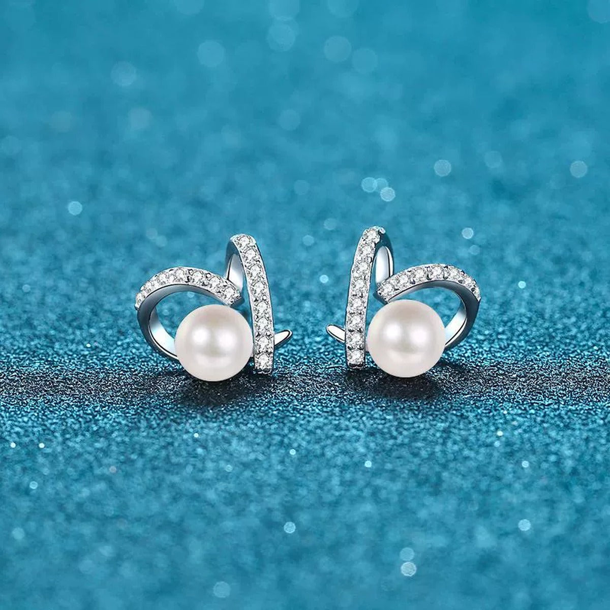 Ribbon Pearl Moissanite Stud Earrings in Rhodium-Plated S925 sterling silver product scene view showing angled setting detail