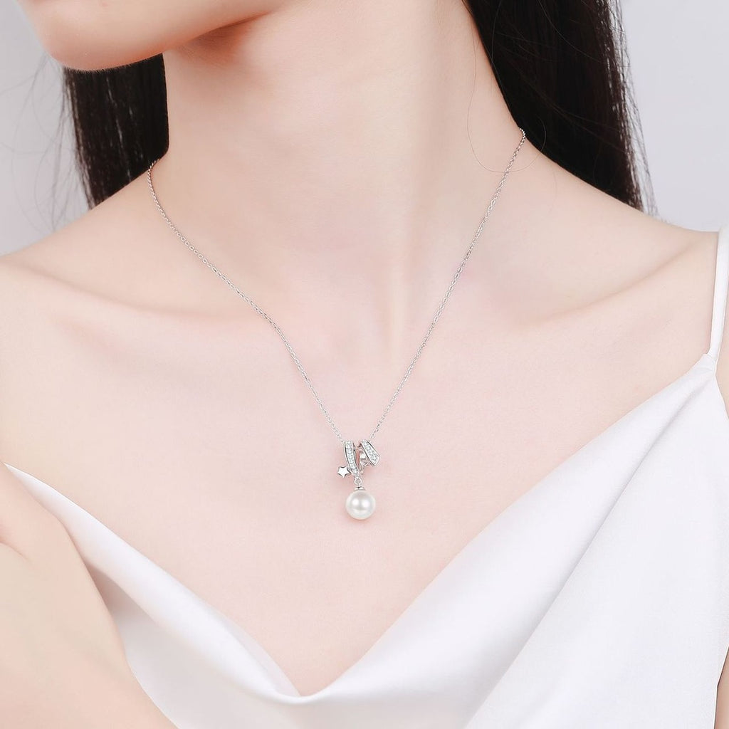 Floral Moissanite Pearl Pendant Necklace in Rhodium-Plated S925 sterling silver neckline model view showing pendant scale and adjustable chain