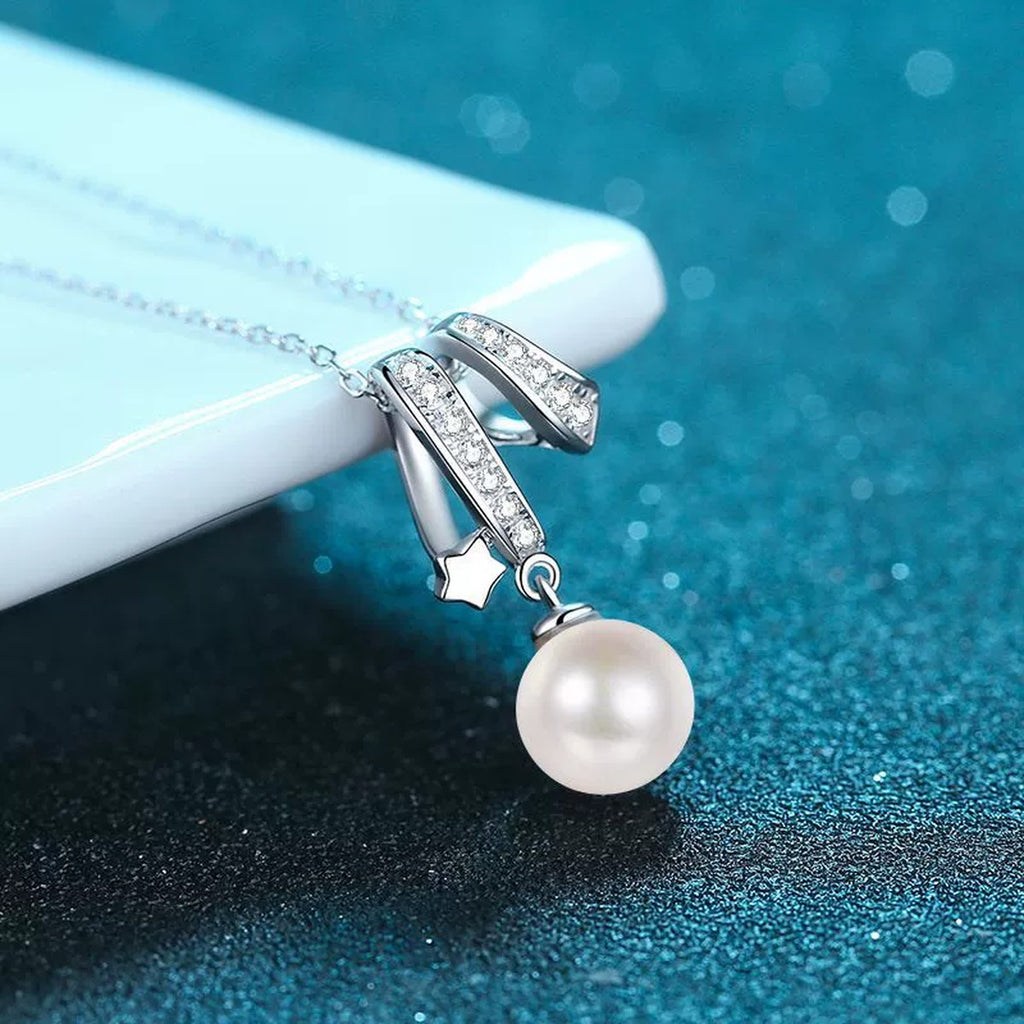 Floral Moissanite Pearl Pendant Necklace in Rhodium-Plated S925 sterling silver blue display scene showing chain and stone layout