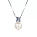 Round Moissanite Pearl Pendant Necklace in Rhodium-Plated S925 sterling silver white background product photo showing round moissanite and near round pearl pendant with a balanced drop silhouette