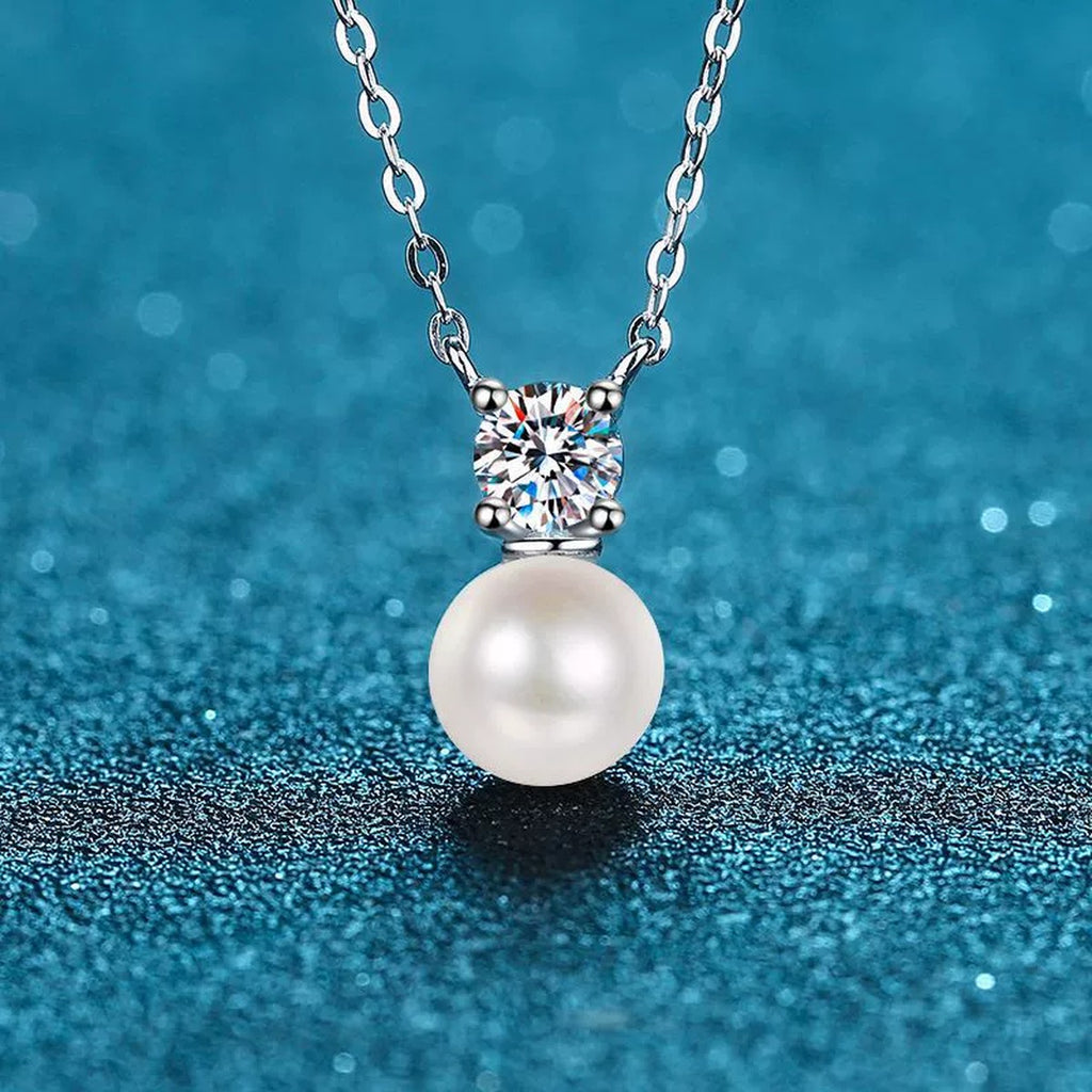 Round Moissanite Pearl Pendant Necklace in Rhodium-Plated S925 sterling silver close-up product scene showing pendant setting