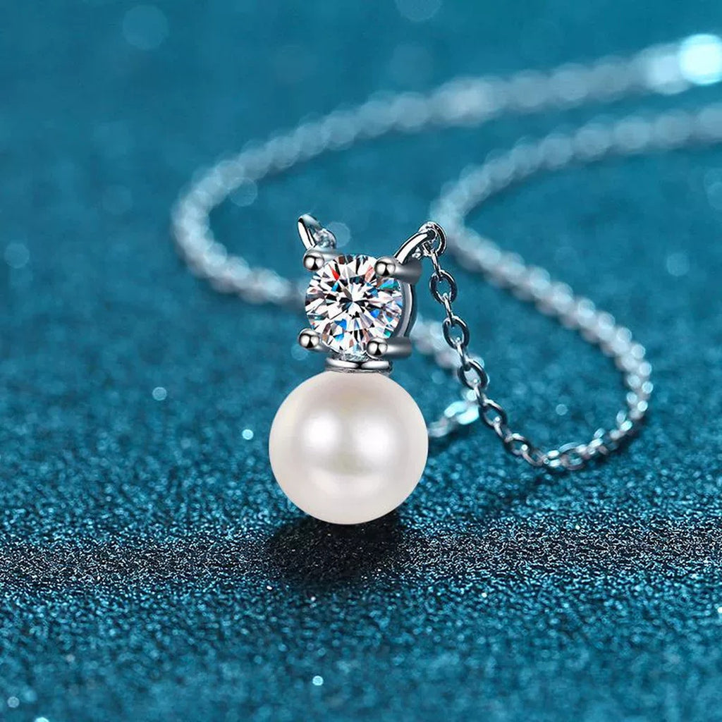 Round Moissanite Pearl Pendant Necklace in Rhodium-Plated S925 sterling silver blue display scene showing chain and stone layout
