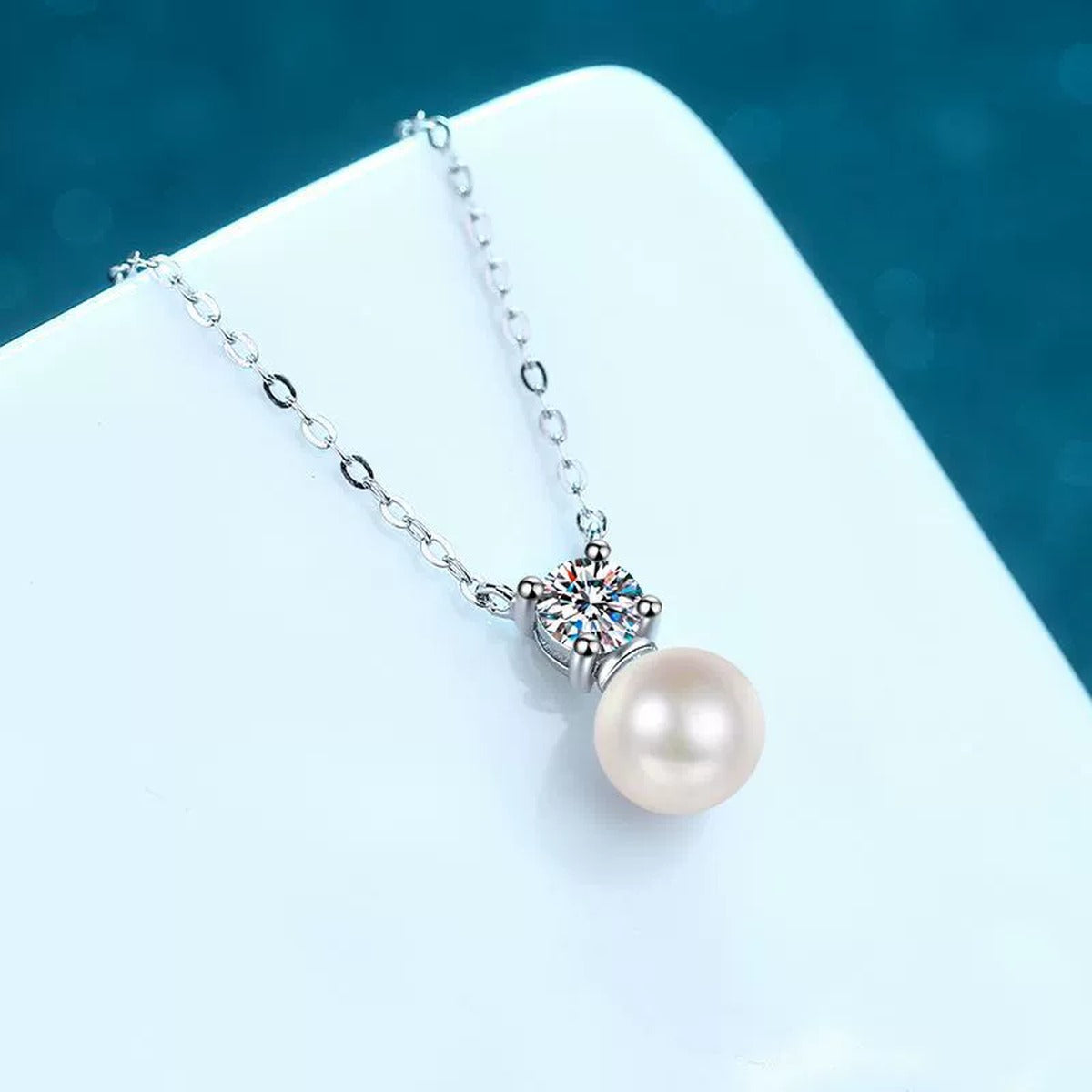 Round Moissanite Pearl Pendant Necklace in Rhodium-Plated S925 sterling silver angled product detail view