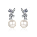 Bow Pearl Moissanite Stud Drop Earrings in Rhodium-Plated S925 sterling silver on white background showing the full pair, pearl and moissanite detail, and stud earrings silhouette