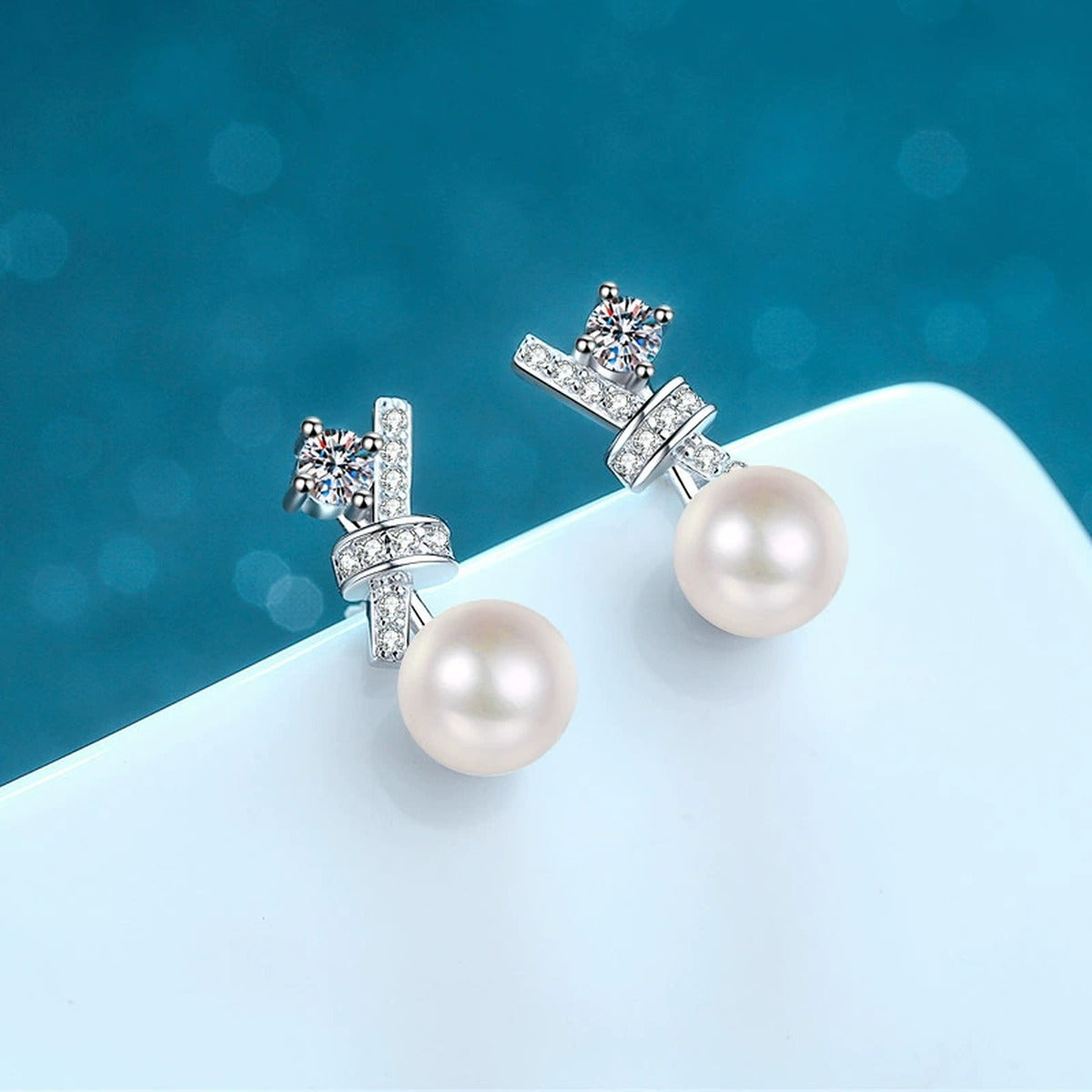 Bow Pearl Moissanite Stud Drop Earrings in Rhodium-Plated S925 sterling silver product scene view showing side profile