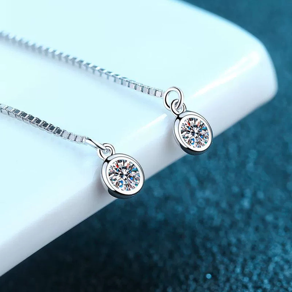 Round Moissanite Threader Drop Earrings in Rhodium-Plated S925 sterling silver product scene view showing angled setting detail