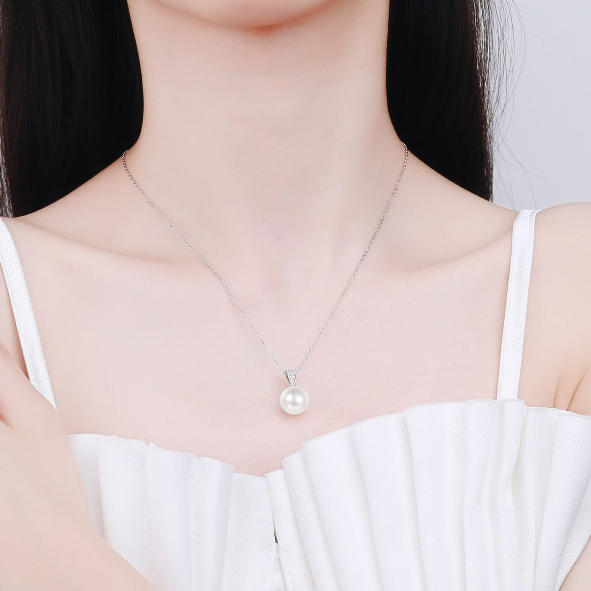V Motif Moissanite Pearl Pendant Necklace in Rhodium-Plated S925 sterling silver neckline model view showing pendant scale and adjustable chain