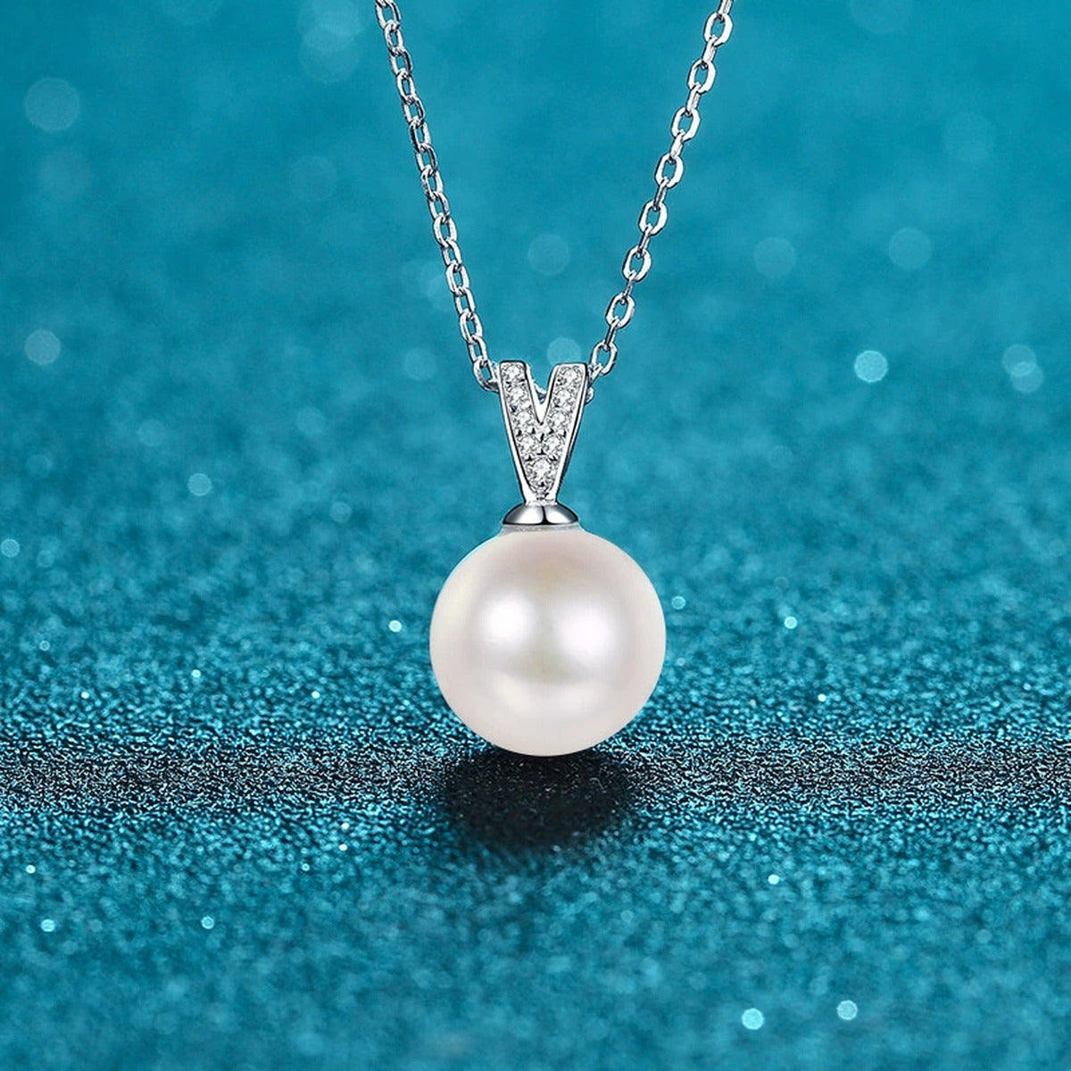V Motif Moissanite Pearl Pendant Necklace in Rhodium-Plated S925 sterling silver close-up product scene showing pendant setting