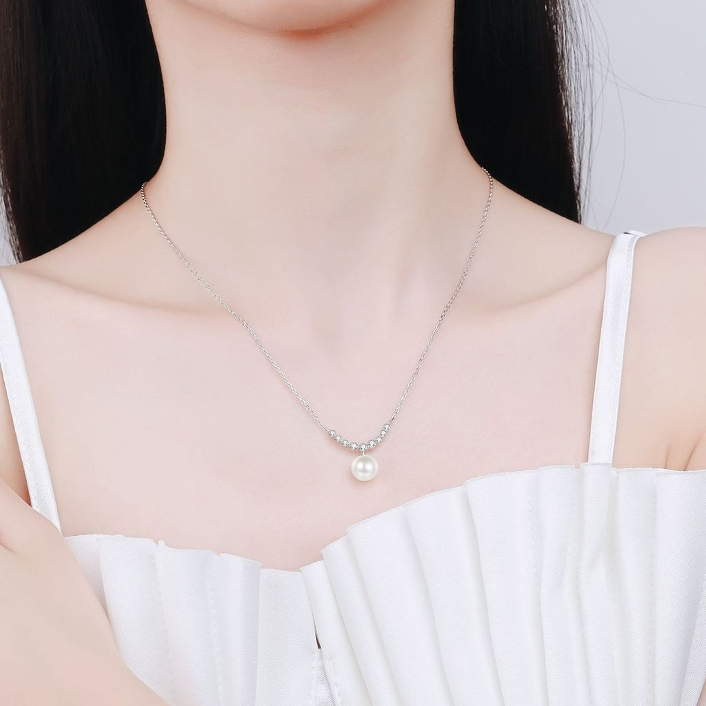 Smile Moissanite Pearl Pendant Necklace in Rhodium-Plated S925 sterling silver neckline model view showing pendant scale and adjustable chain