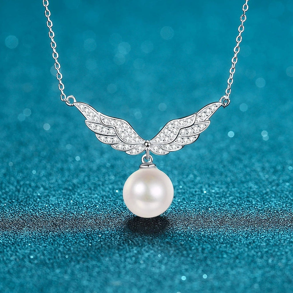 Angel Wing Moissanite Pearl Pendant Necklace in Rhodium-Plated S925 sterling silver close-up product scene showing pendant setting