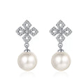Leaf Cluster Pearl Moissanite Stud Dangle Earrings in Rhodium-Plated S925 sterling silver on white background showing the full pair, pearl and moissanite detail, and stud dangle earrings silhouette