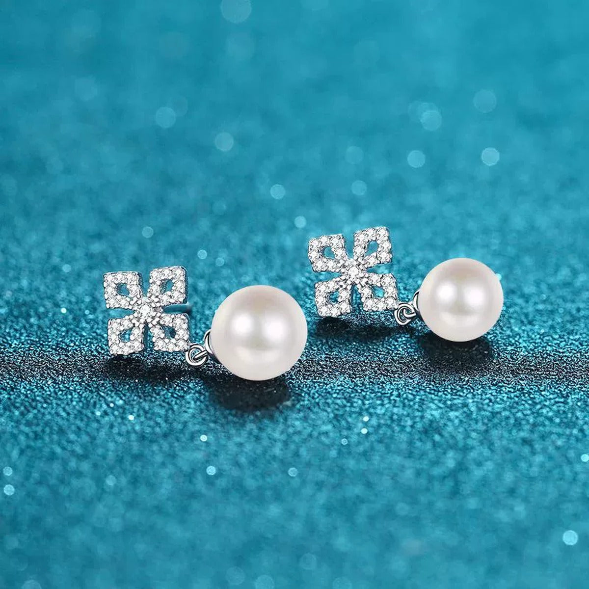 Leaf Cluster Pearl Moissanite Stud Dangle Earrings in Rhodium-Plated S925 sterling silver product scene view showing angled setting detail