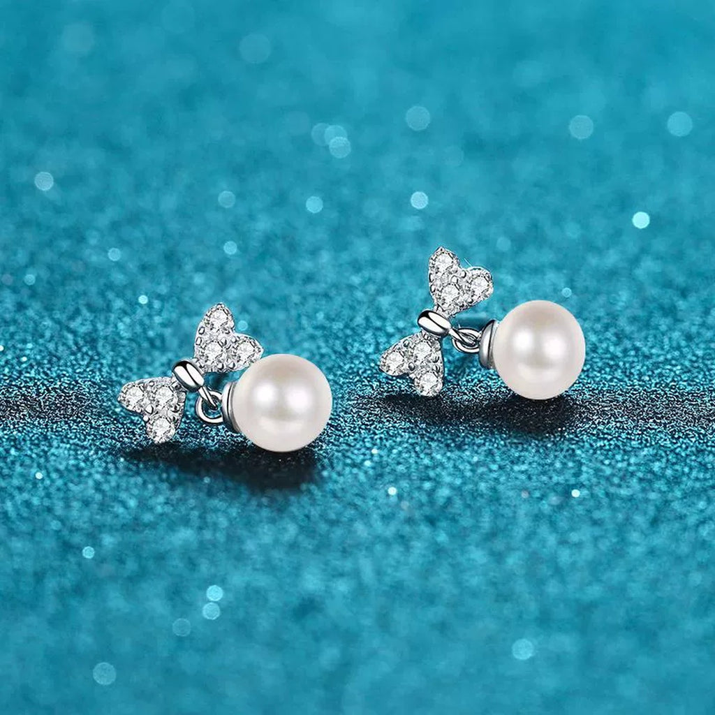 Bow Moissanite Stud Dangle Earrings in Rhodium-Plated S925 sterling silver product scene view showing side profile