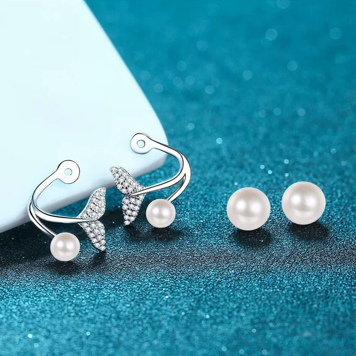 Mermaid Tail Pearl Moissanite Stud Drop Earrings in Rhodium-Plated S925 sterling silver product scene view showing angled setting detail