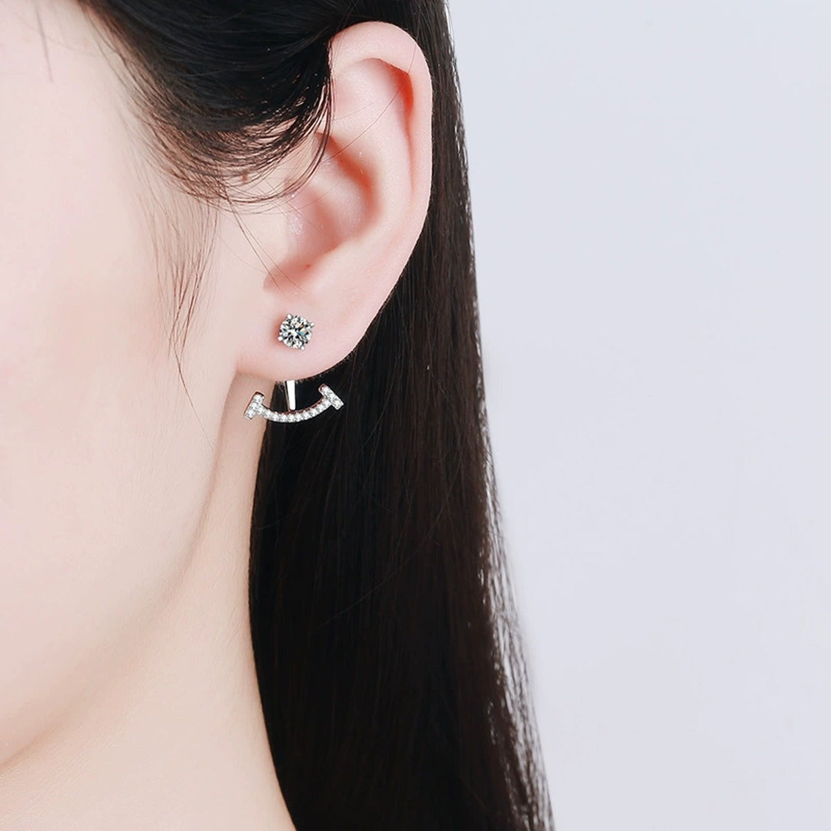 Moissanite Jacket Stud Earrings with CZ in Rhodium-Plated S925 sterling silver worn on ear by model showing scale, placement, and jacket stud earrings styling