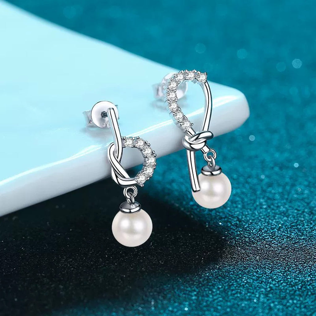 Ribbon Bow Pearl Moissanite Stud Dangle Earrings in Rhodium-Plated S925 sterling silver product scene view showing front detail
